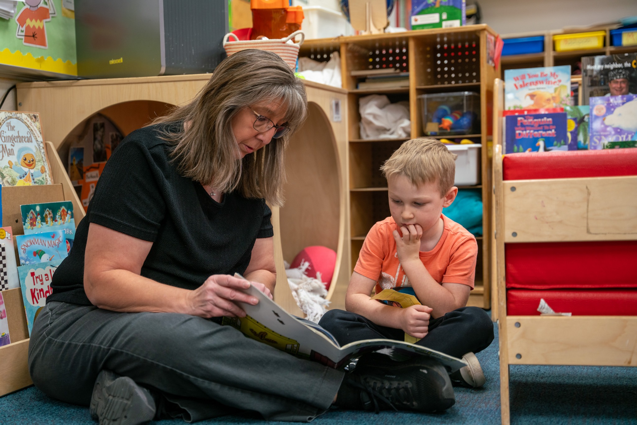 Student and teacher reading