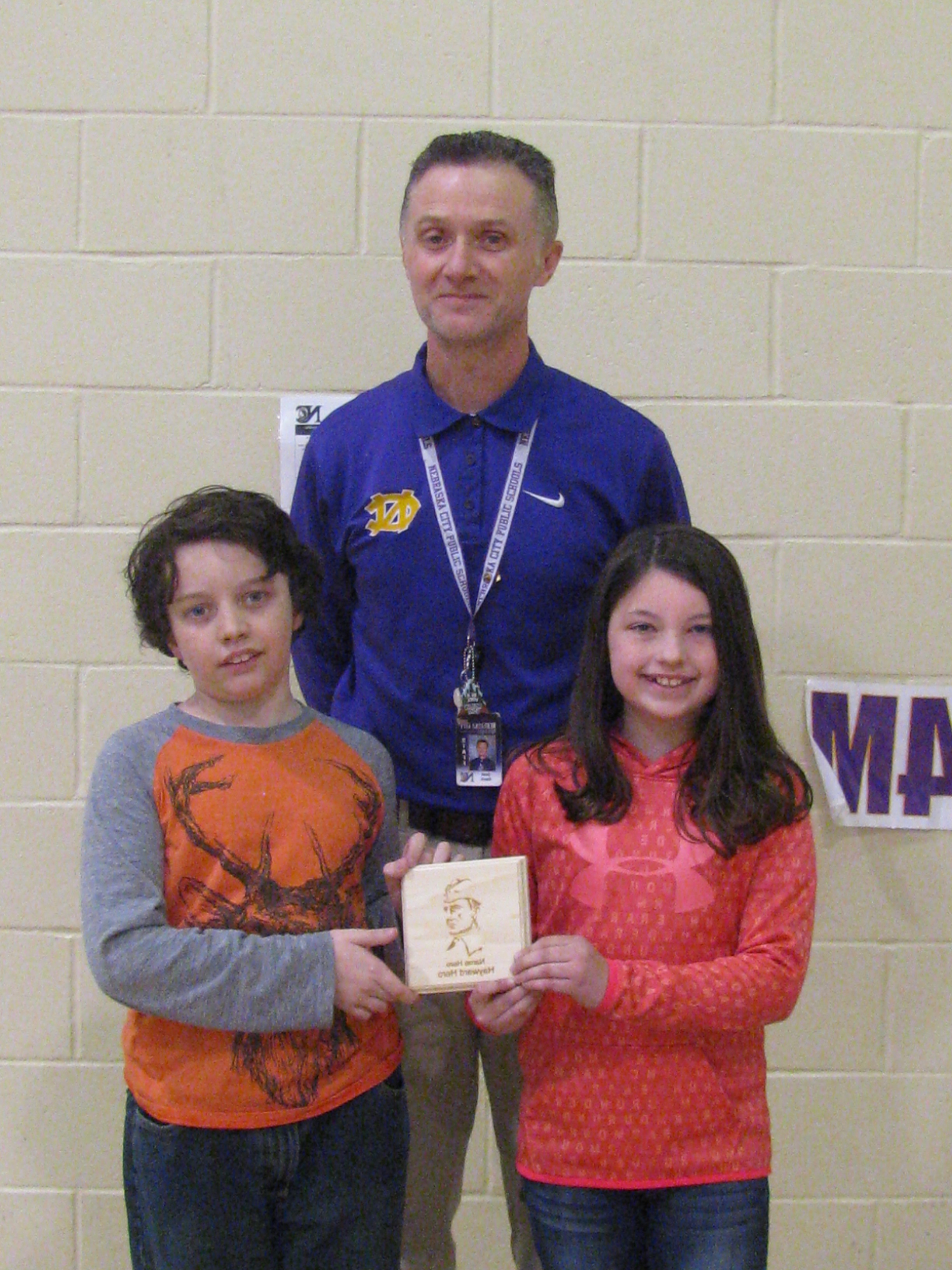 A photo of Miles, Mr. Davis and Addisyn.