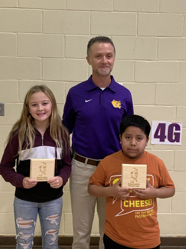 A photo of Makensie, Mr. Davis and Roberto.