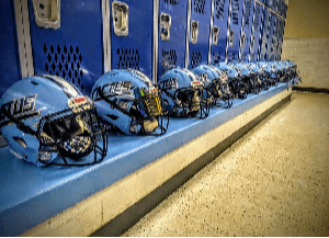 Cactus helmets lined up in a locker room
