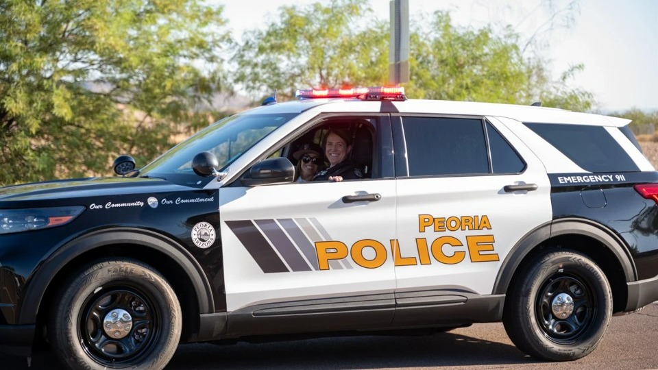 Liberty SRO in police vehicle