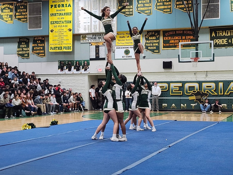 Cheer team doing a stunt