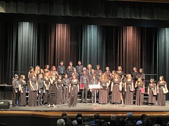 Choir students performing on stage