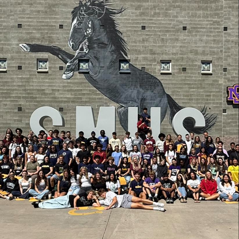 Students in front of the SMHS sign