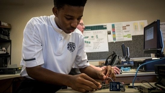 Student working on a computer network