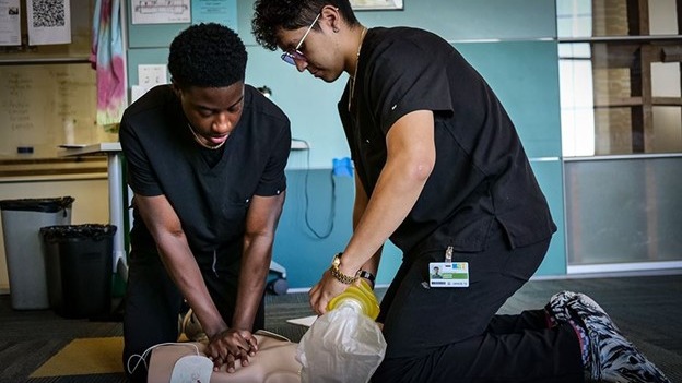 Medical students practicing CPR