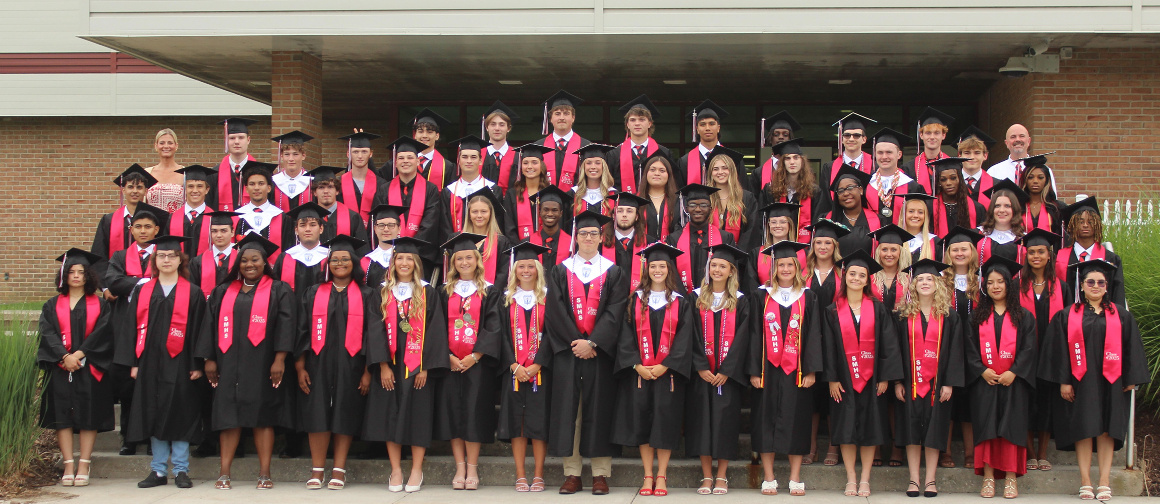group shot of the graduating class of 2025 in robes