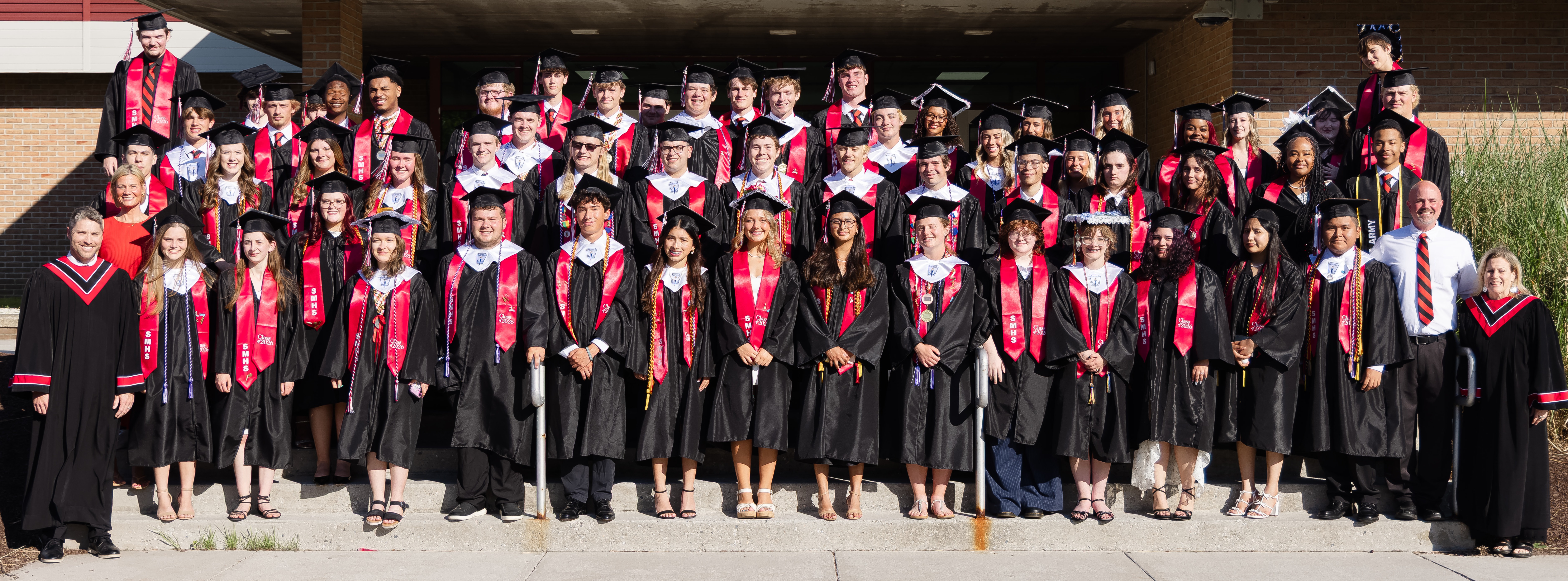 group shot of the graduating class of 2026 in robes