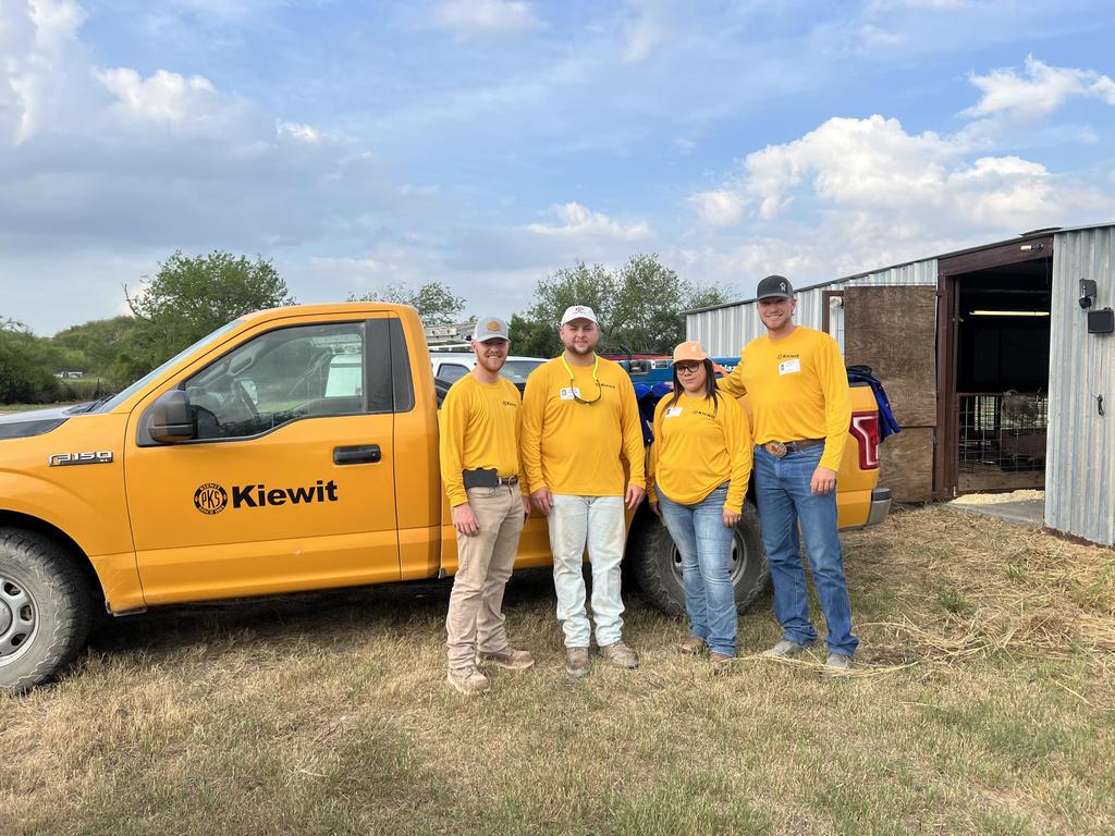 Volunteers from Knight's Ranch Kennel Club working together to care for dogs and promote animal welfare.
