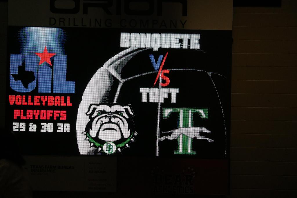 A large screen displaying the text "bonet vs taft volleyball playoffs" prominently for viewers at the event.