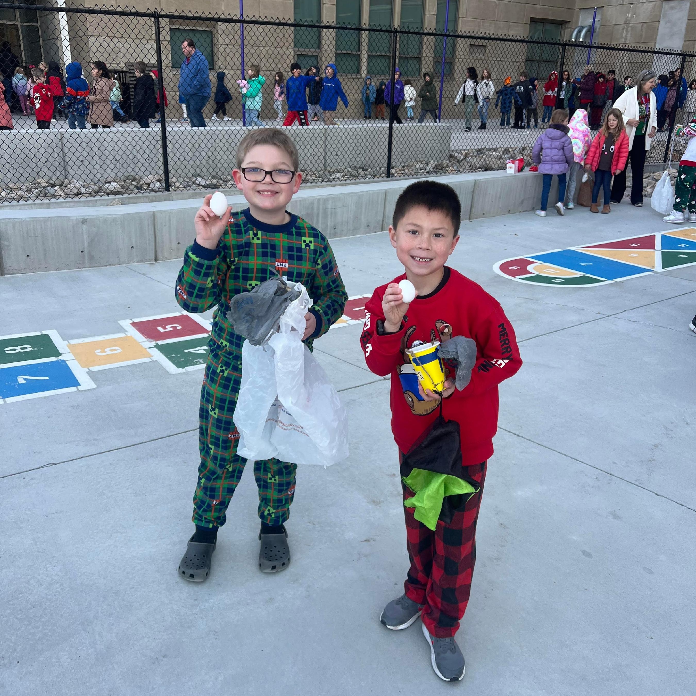 Students with their egg drop science projects