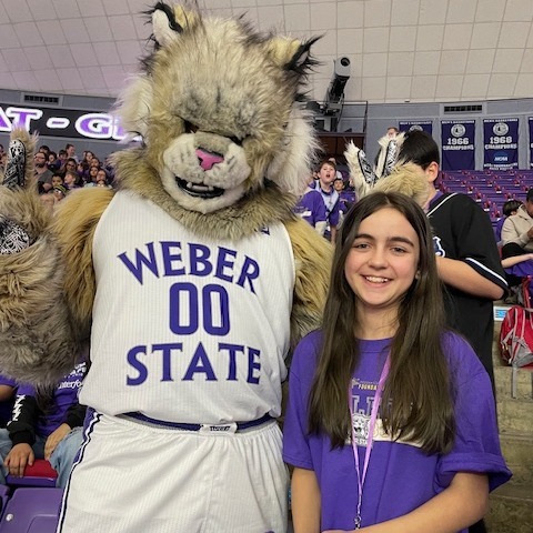 Student with Waldo the Wildcat