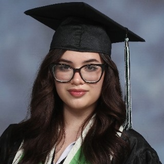 Student with graduation hat and glasses