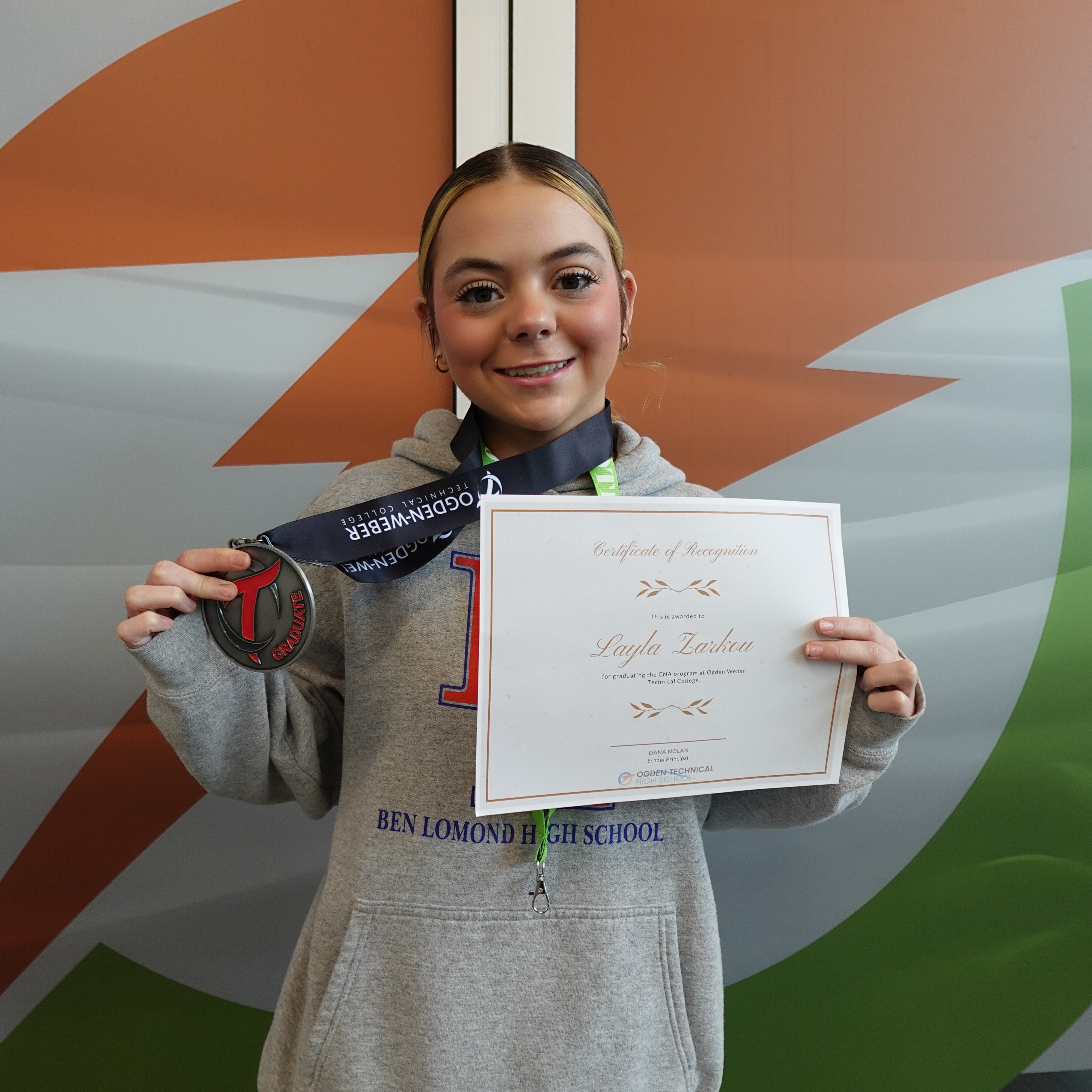 Layla with her college completion certificate  