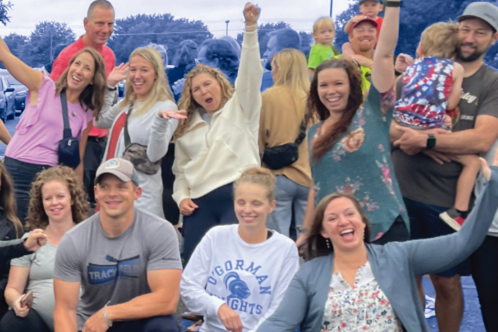 group of parents cheering