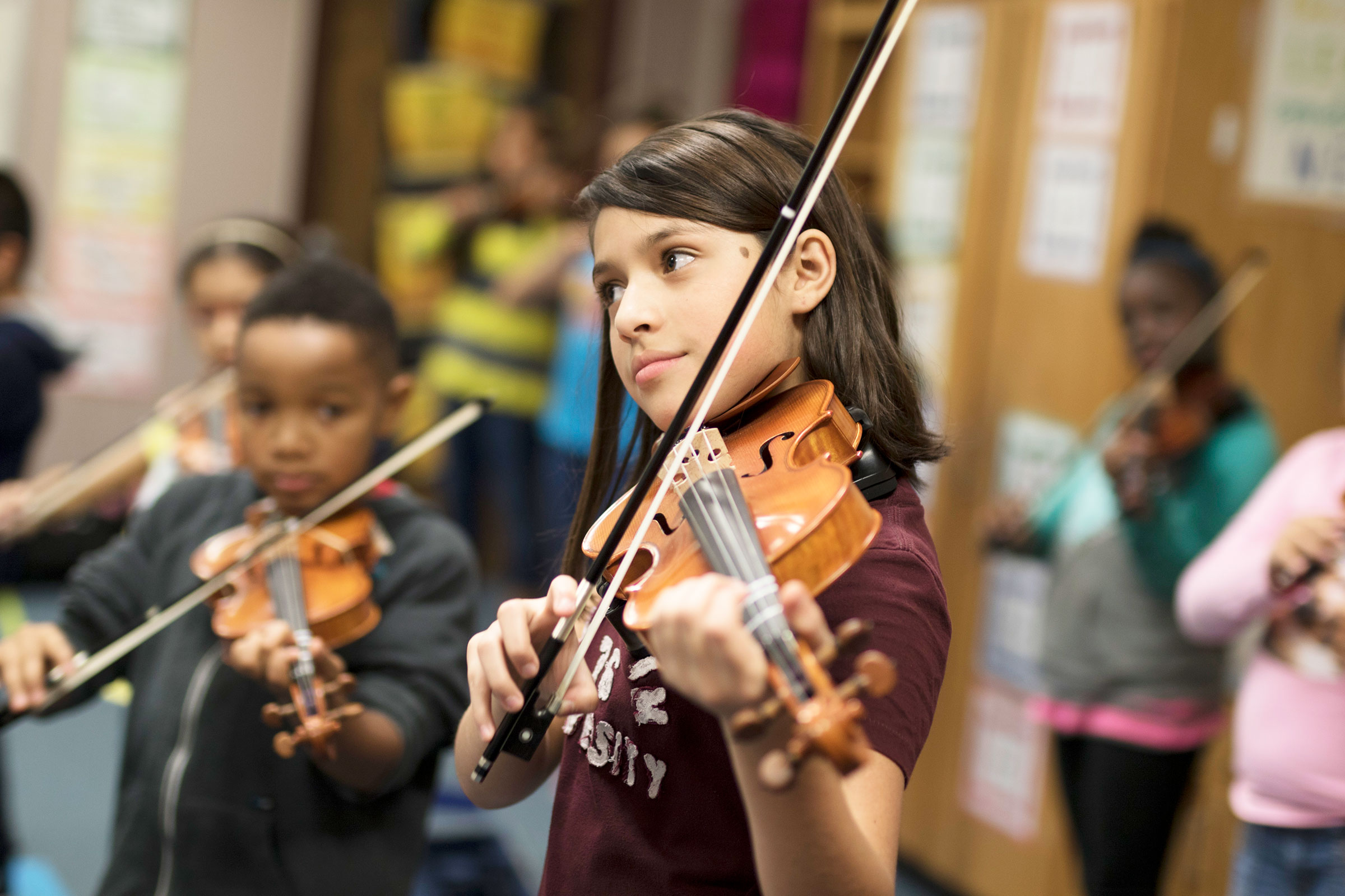 Berkman student playing violin