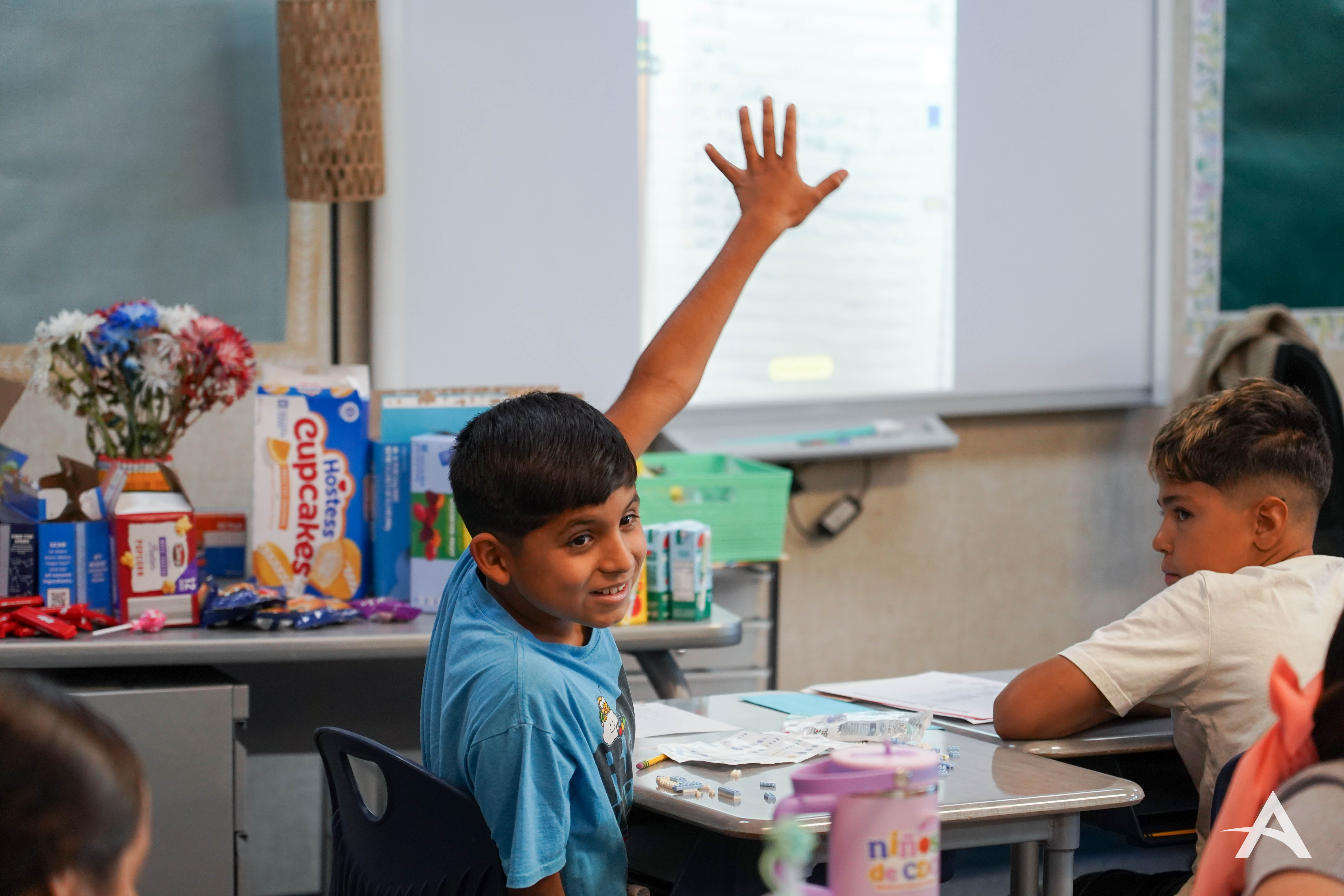 Global student with hand raised