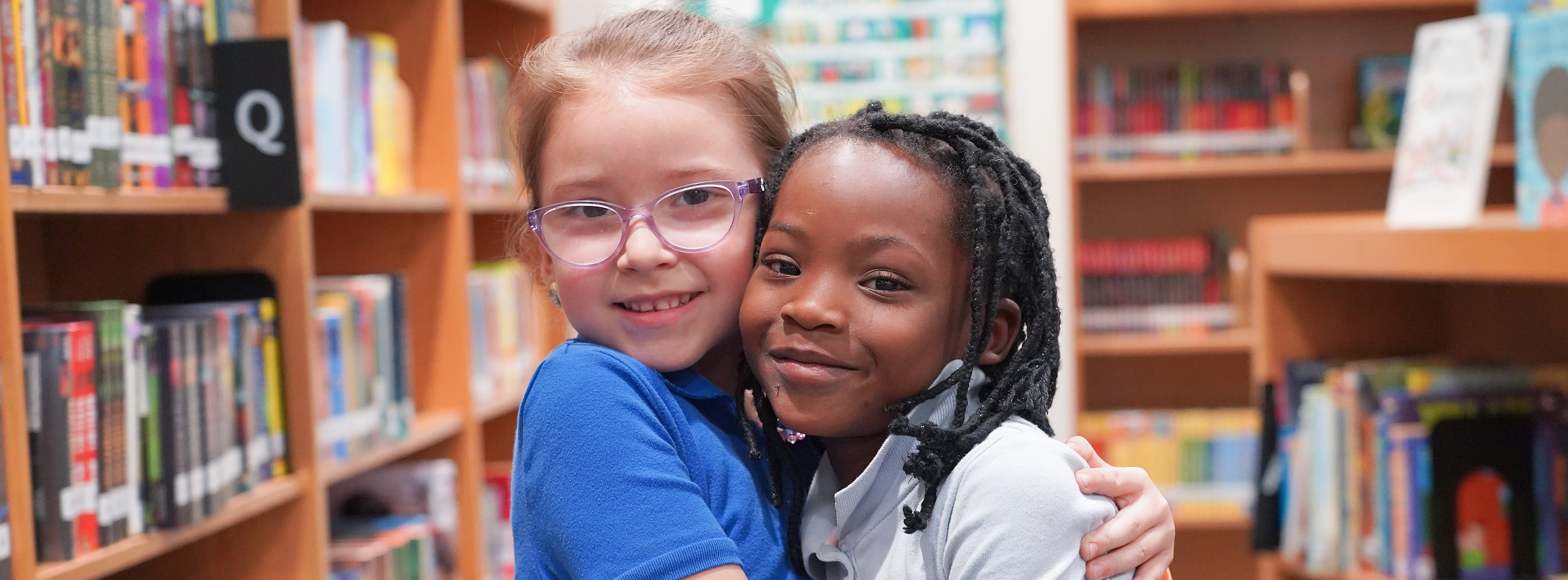 James W. Rice students hugging