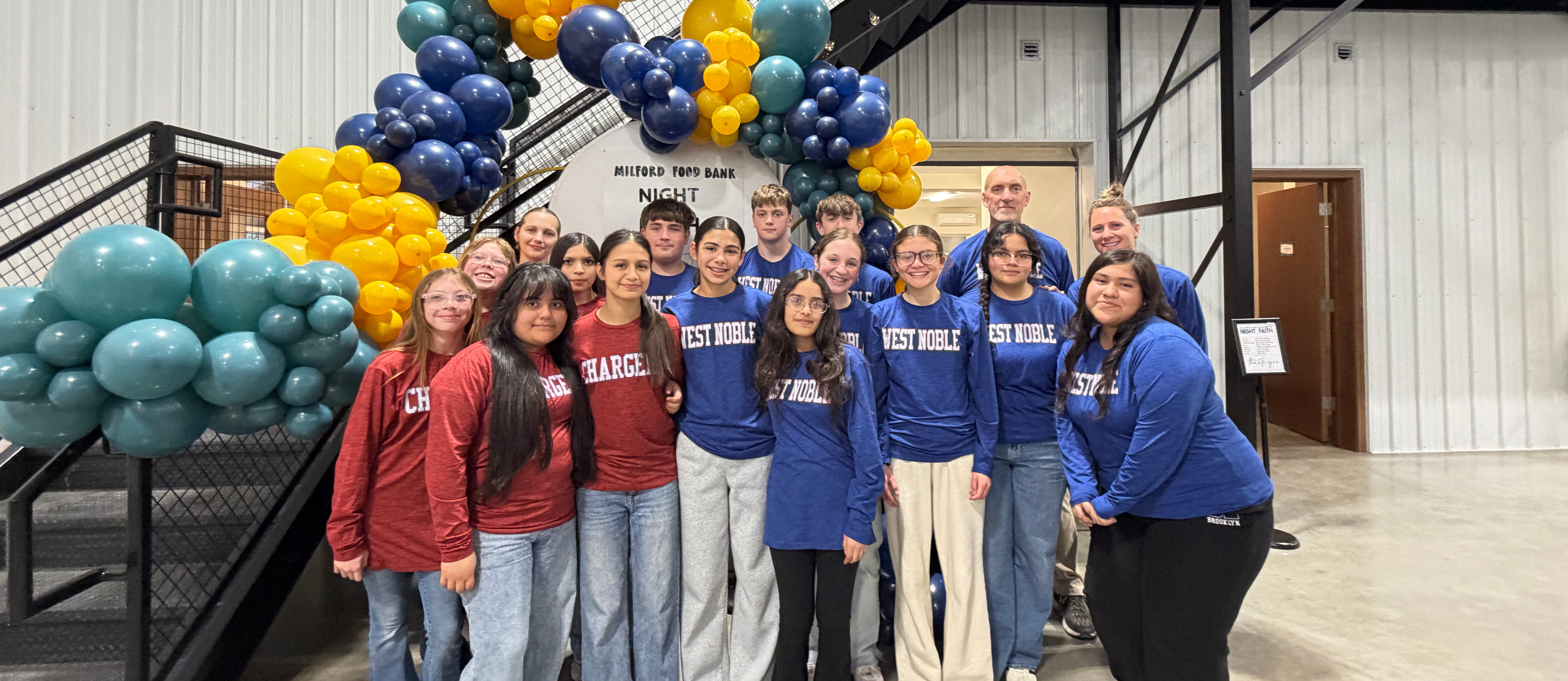 middle school students at milford food bank