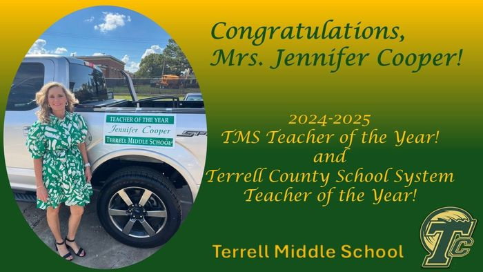 Image of a proud teacher holding a "Teacher of the Year" award, celebrating their dedication and excellence in education.