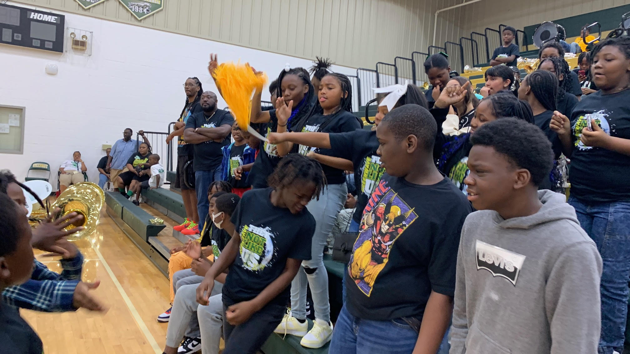 students laughing at pep rally