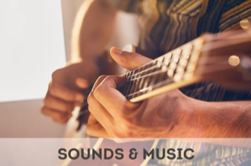 hands strumming a guitar Sounds and Music