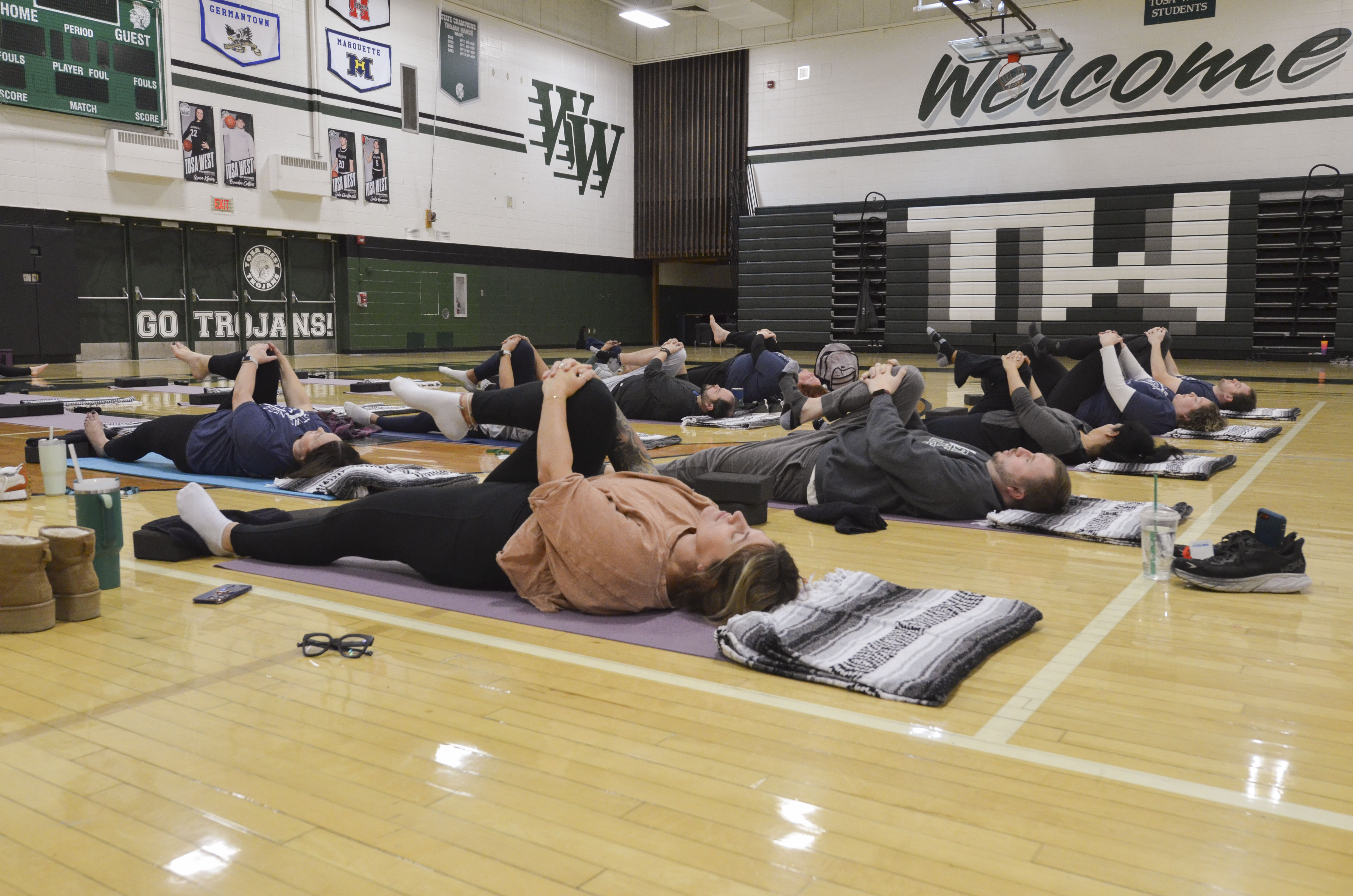 West Staff Engaging in Yoga on Staff Wellness Day
