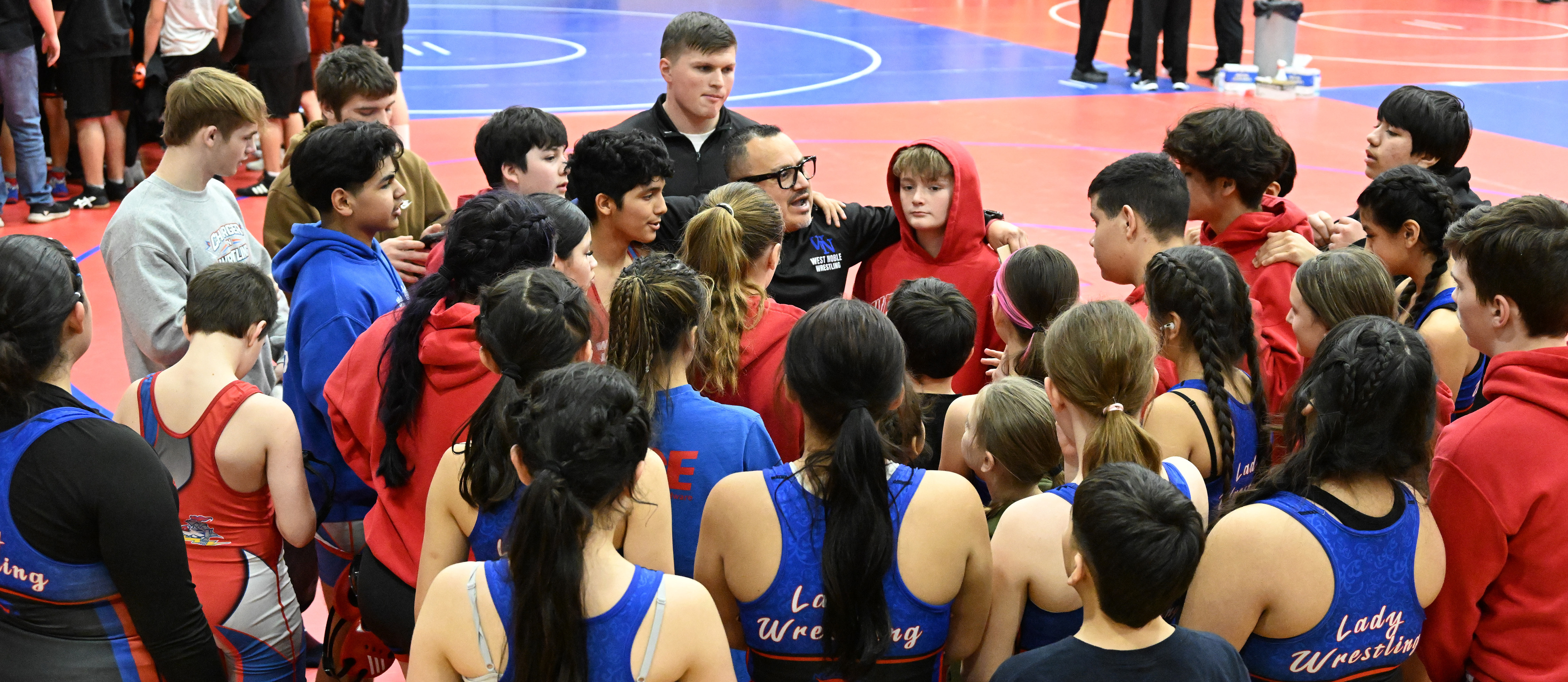 noe macias talking to his wrestling teams at an invitational