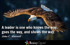 A leader guiding others, embodying knowledge, action, and direction, symbolizing inspiration and mentorship.