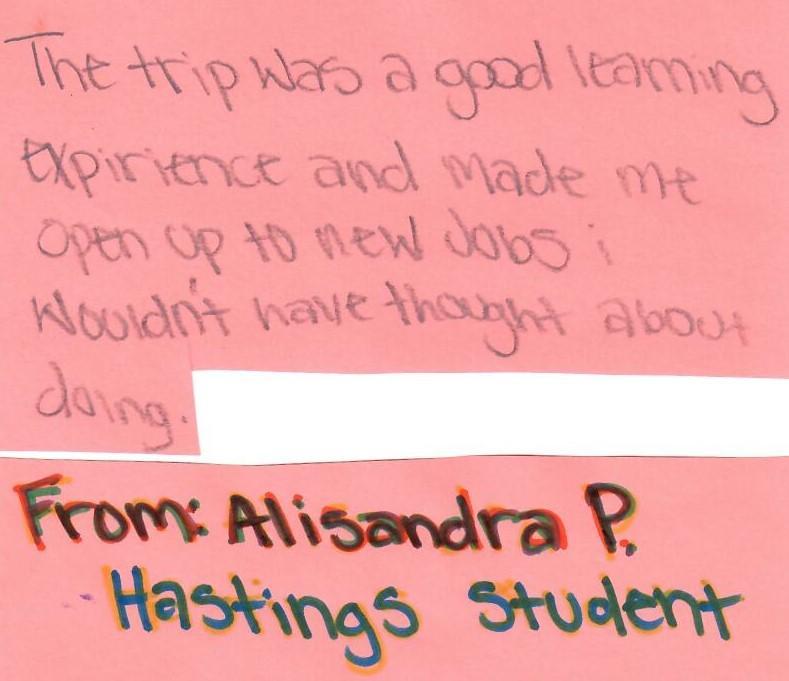 Handwritten note on a pink sticky note expressing appreciation for a learning trip from Alisandra P., a Hastings student.
