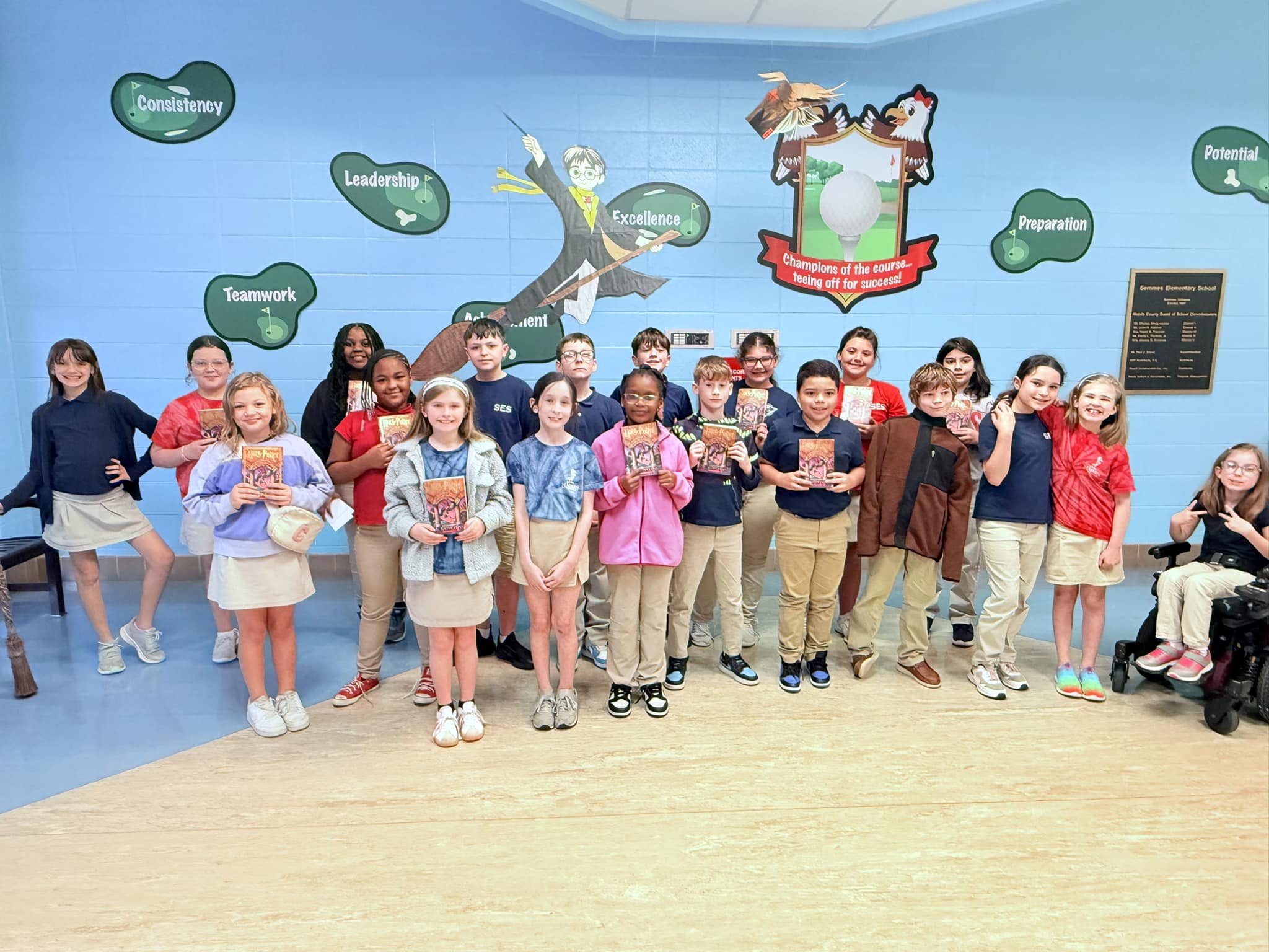 group of students with Harry Potter