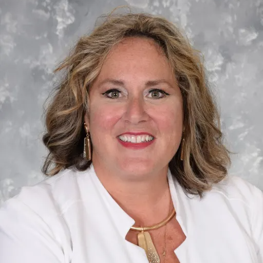 Amelia Gioffredo - treasurer - White Jacket, Black Shirt, Gold Necklace, Blonde hair