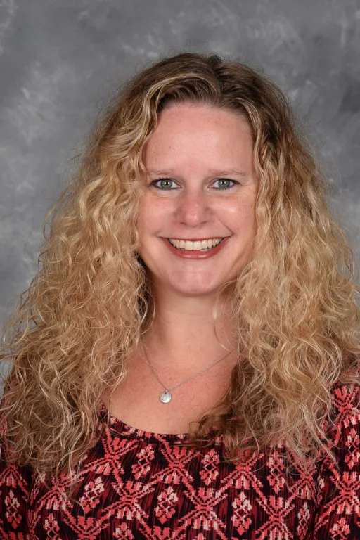 Deanne Kelbley - Blonde Curly Hair, red Patterned Blouse