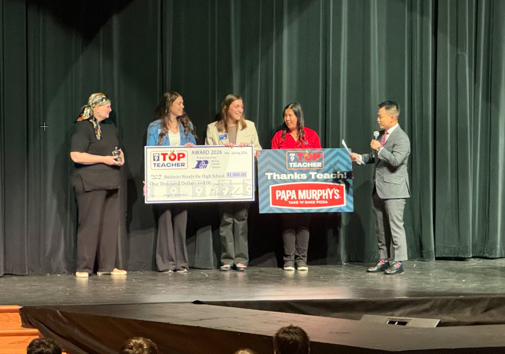 Teacher receiving award