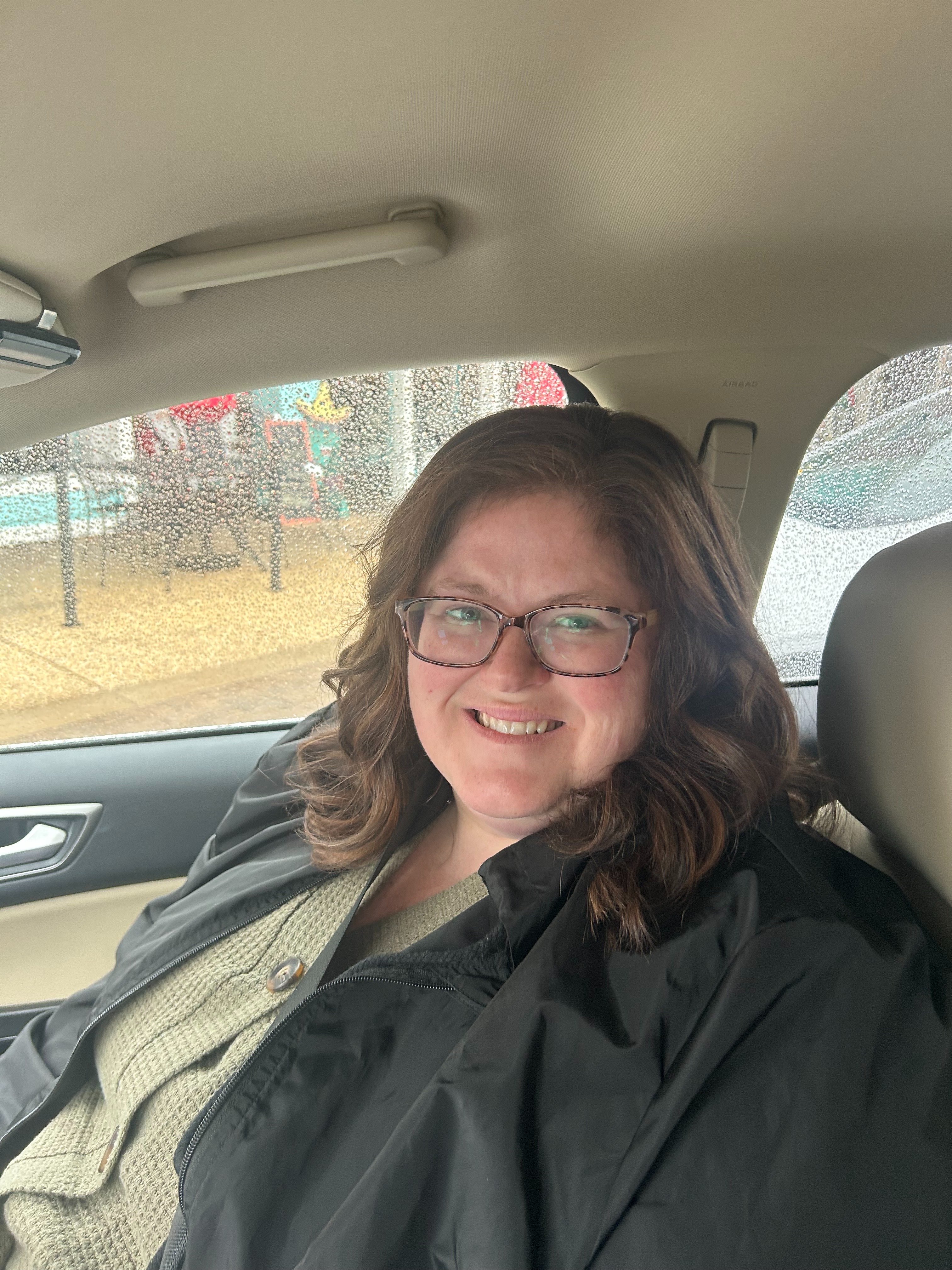 The librarian sits for a picture