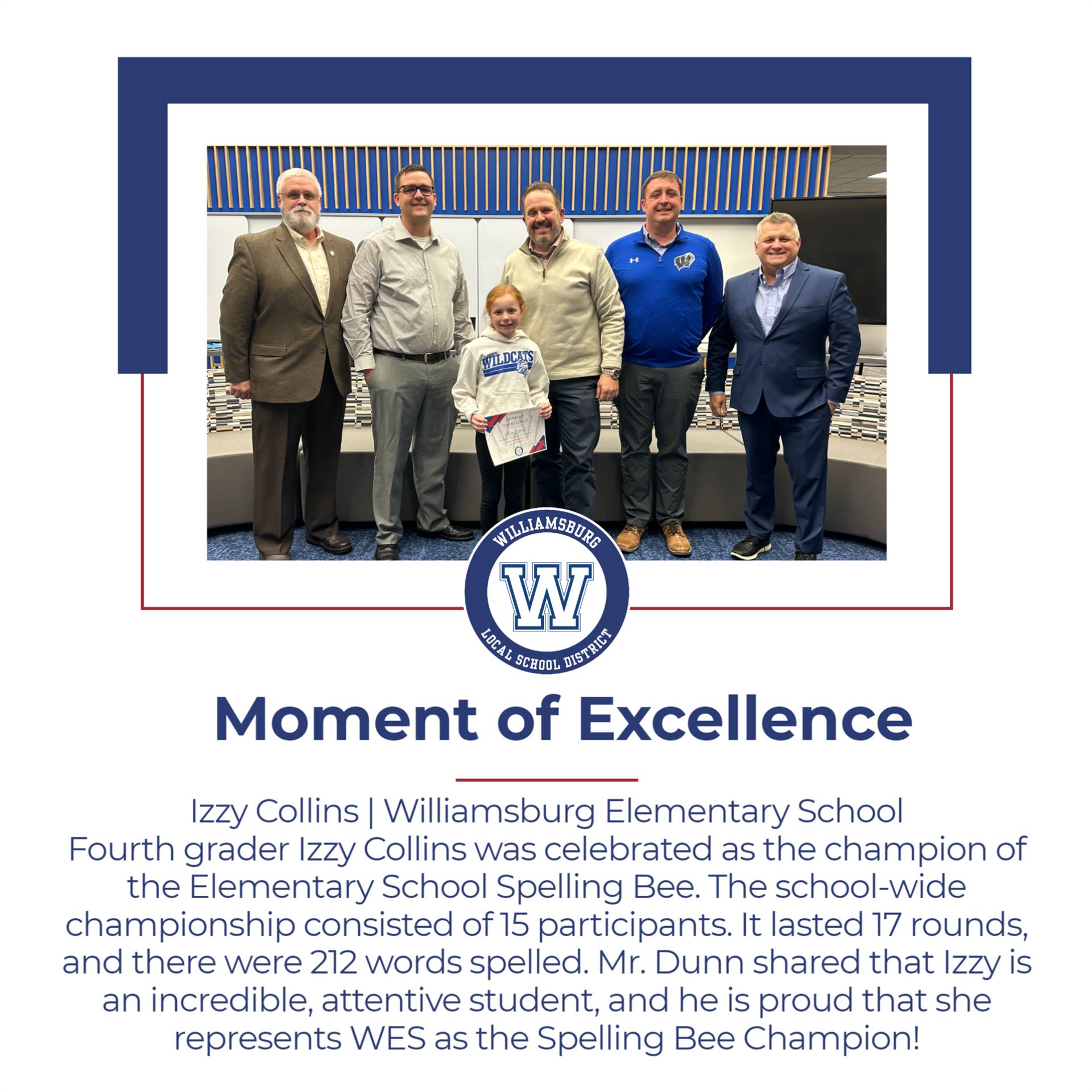A group of educators celebrates fourth grader Izzy Collins, winner of the Williamsburg Elementary School Spelling Bee.
