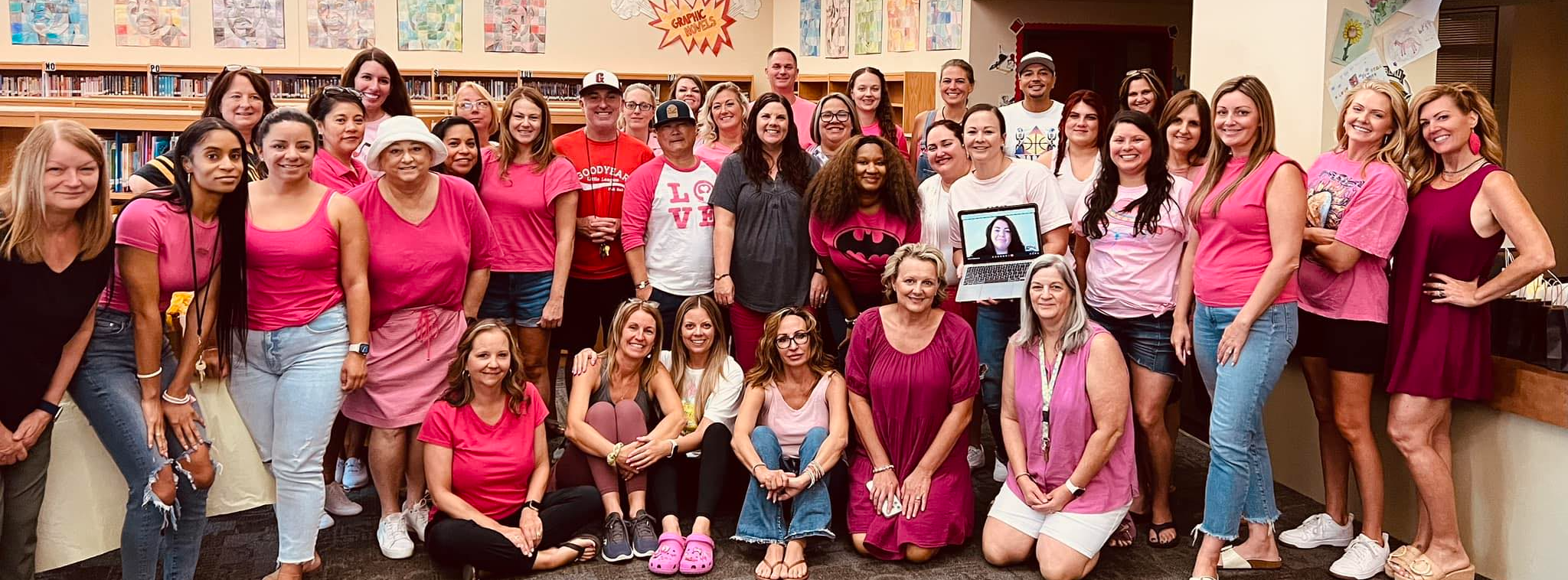 MPE staff wearing pink photograph