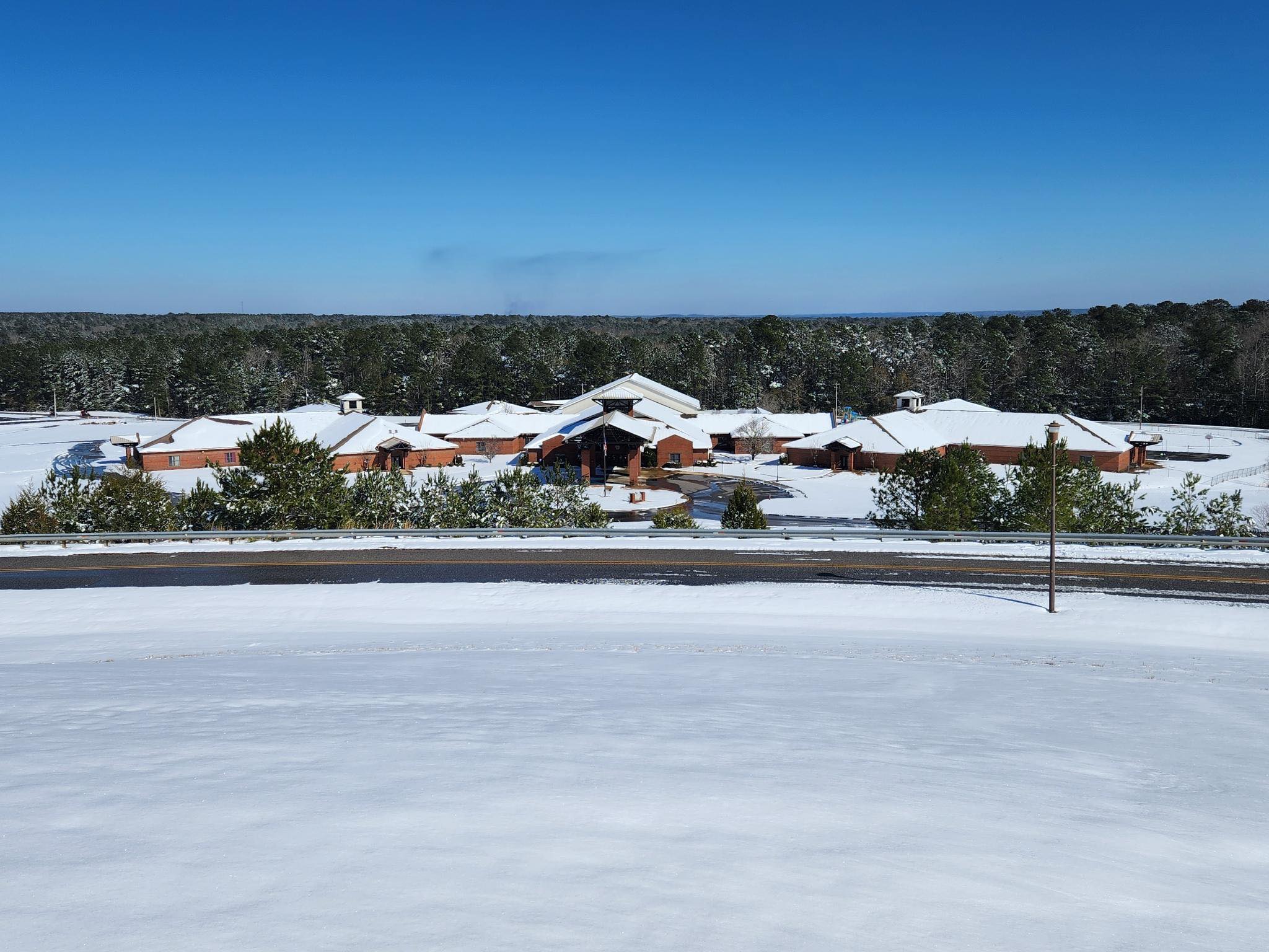 A snowy school building.
