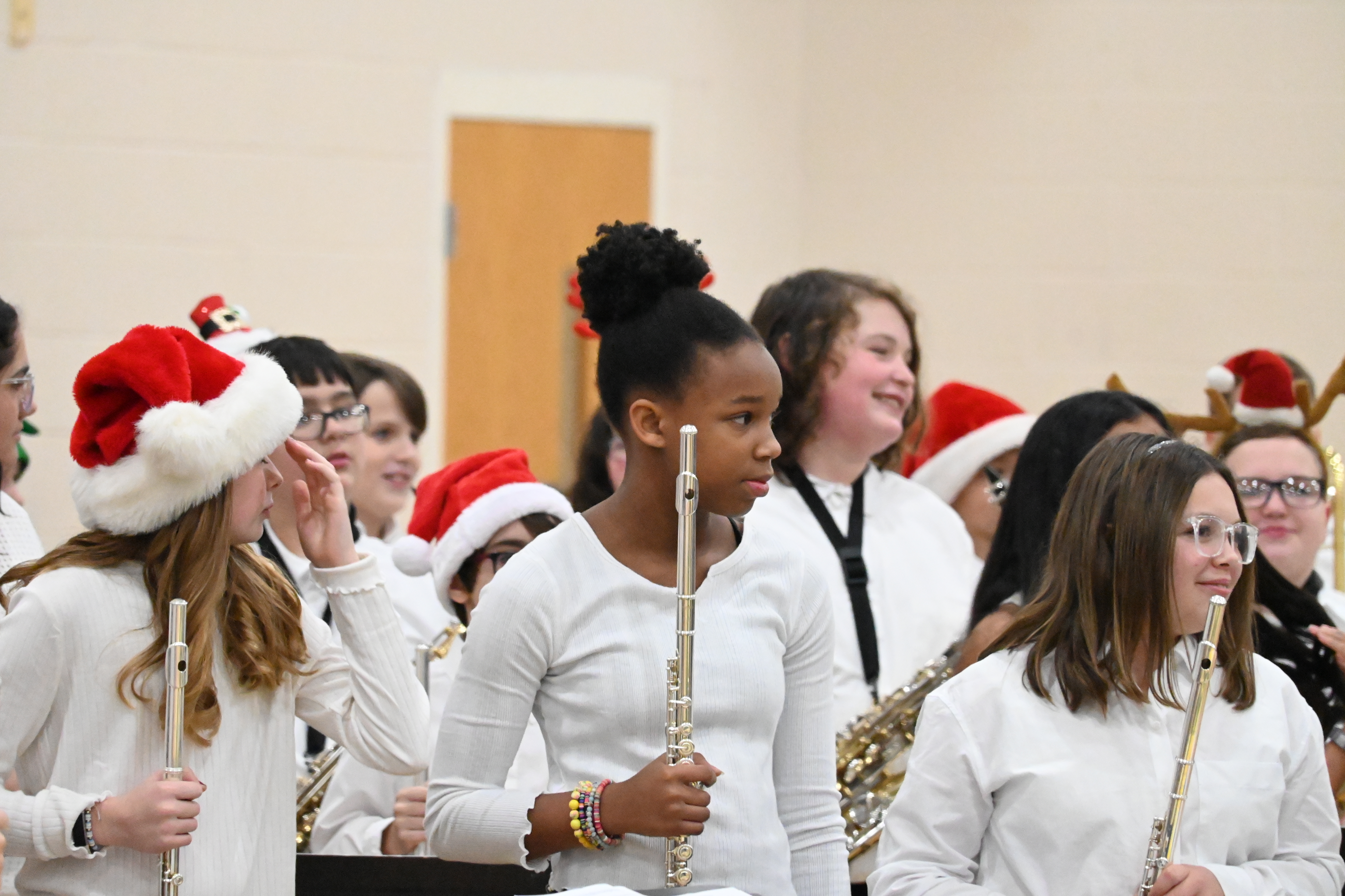 Students standing for applause at Winter Band Concert 