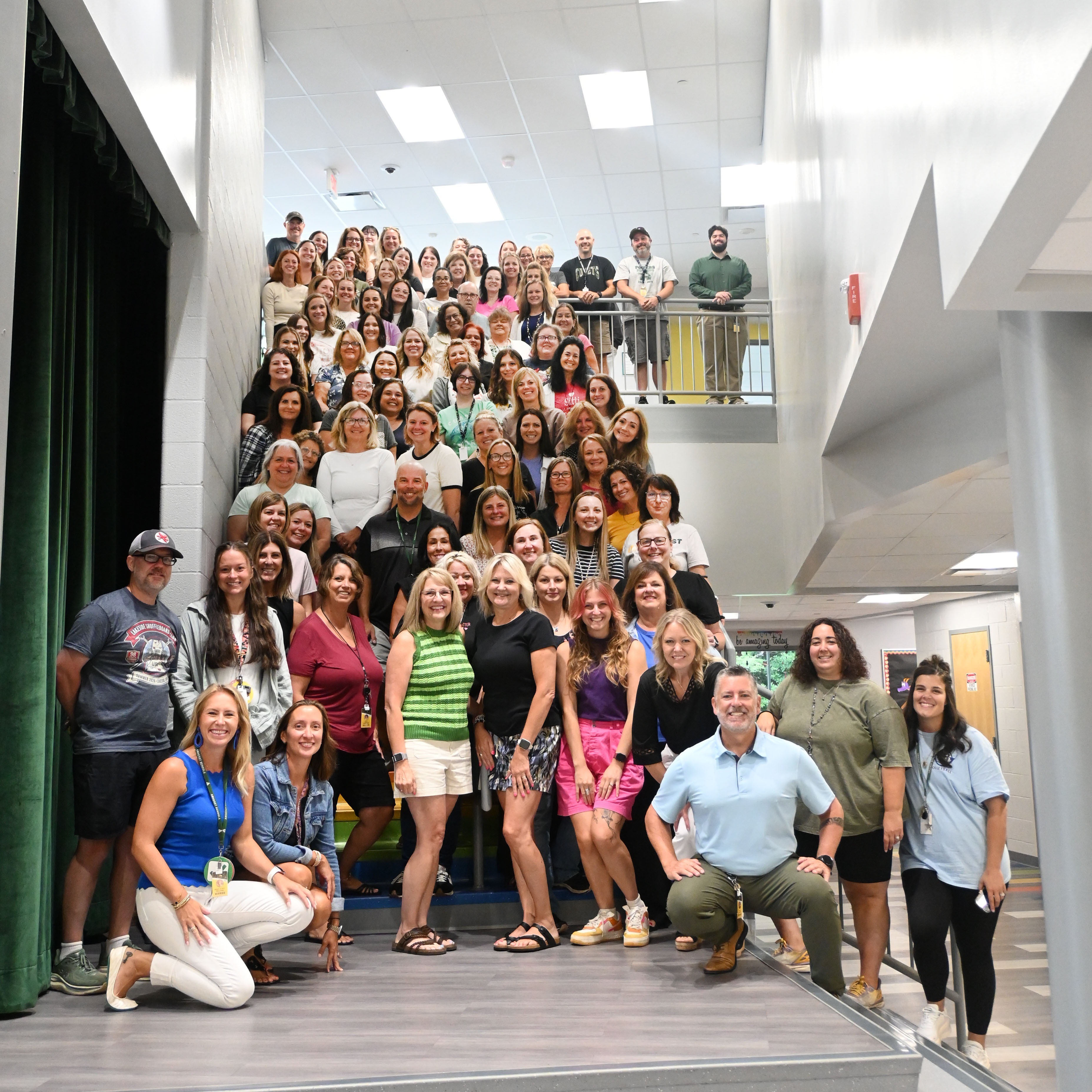 POWERS STAFF FOR THE 2026-2027 SCHOOL YEAR POSING ON THE STEPS 