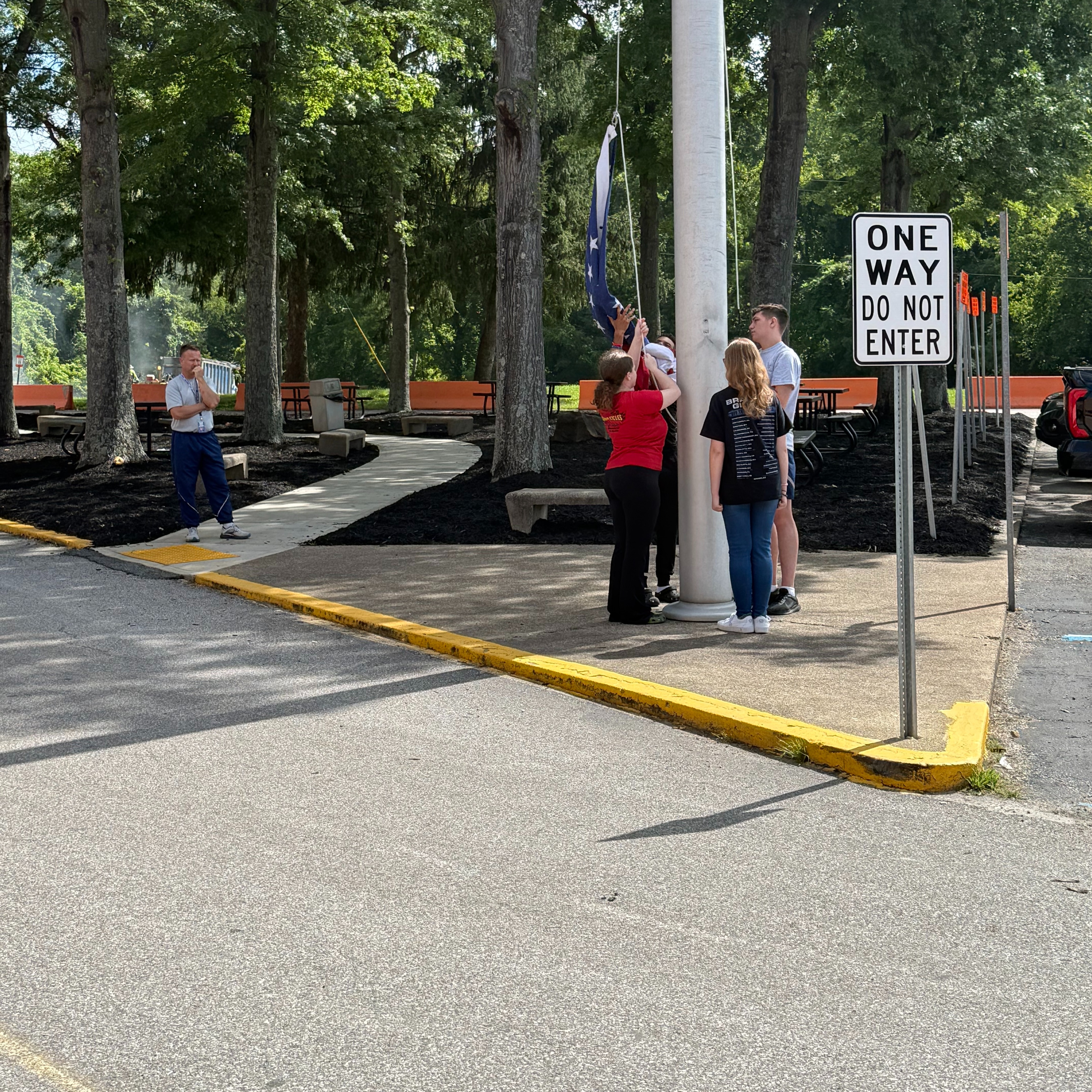 SCHS JROTC students practicing raising the american flag.