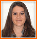 A woman with long, dark hair is wearing a casual top against a light background, framed by an orange border.