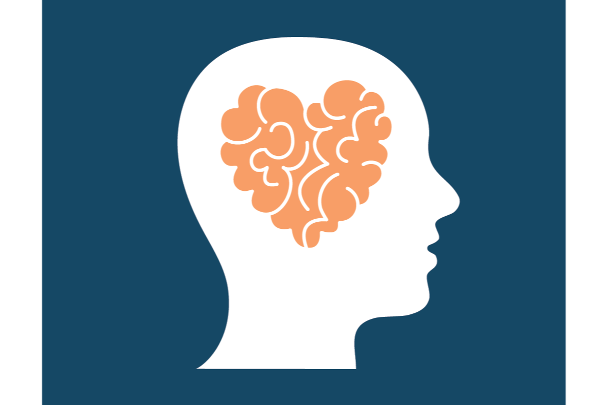 white silhouette of a head with an orange heart shaped brain