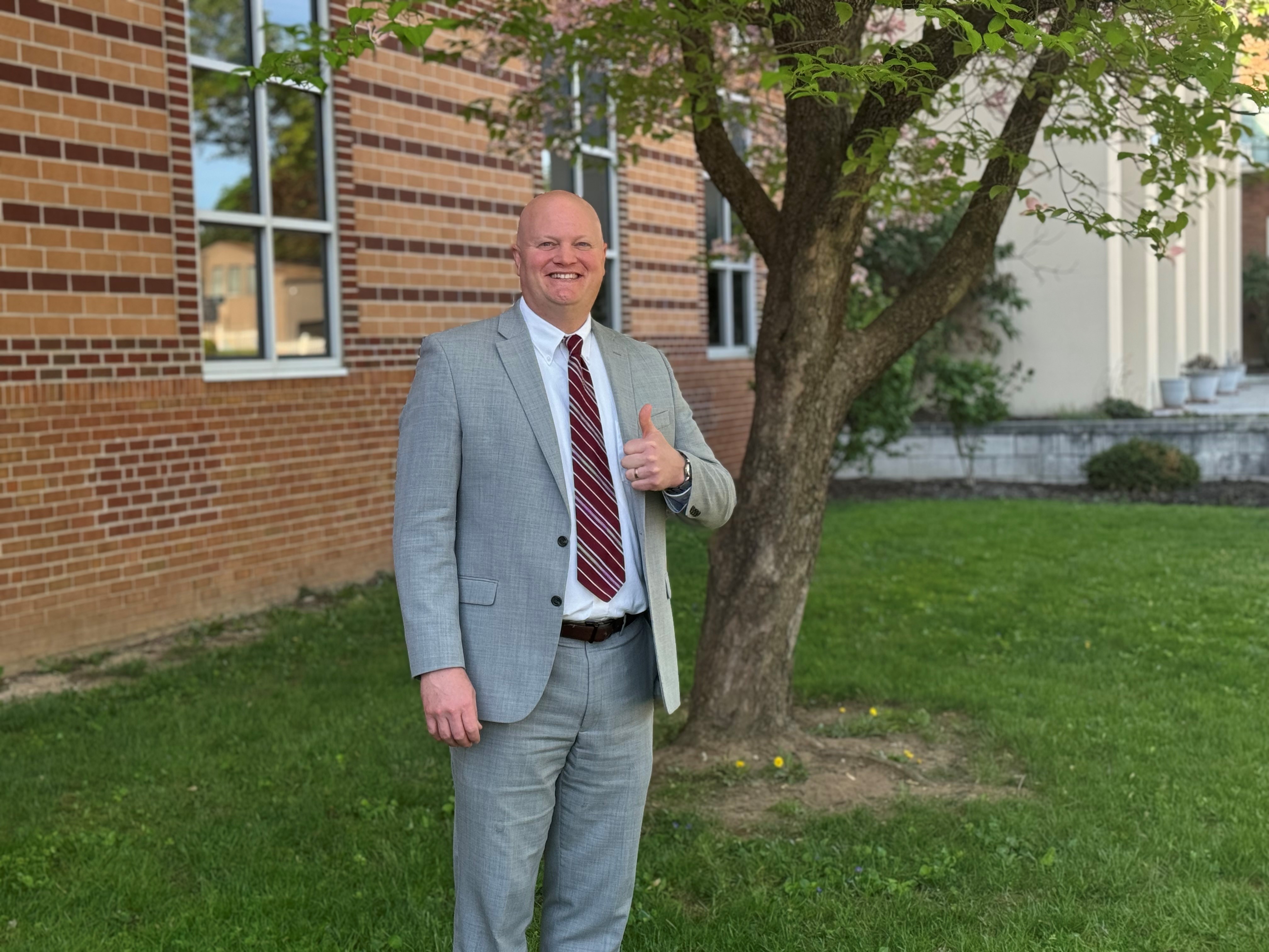 Picture of Principal outside of building