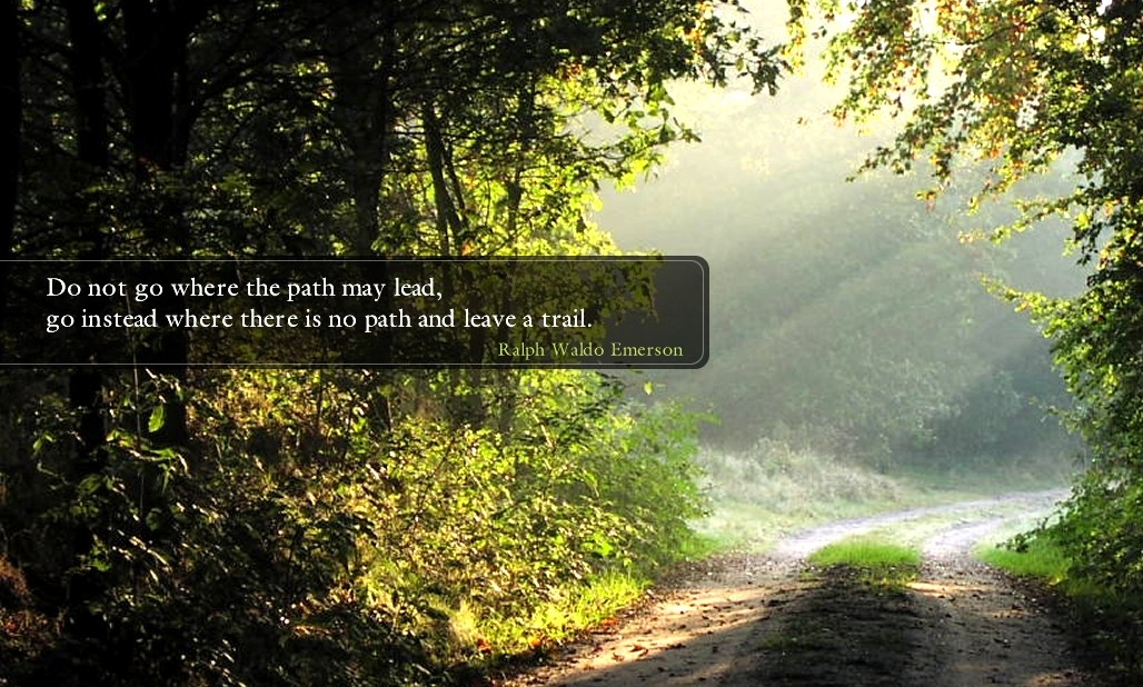 Sunlit forest path with a quote by Ralph Waldo Emerson encouraging individuality and trailblazing. 