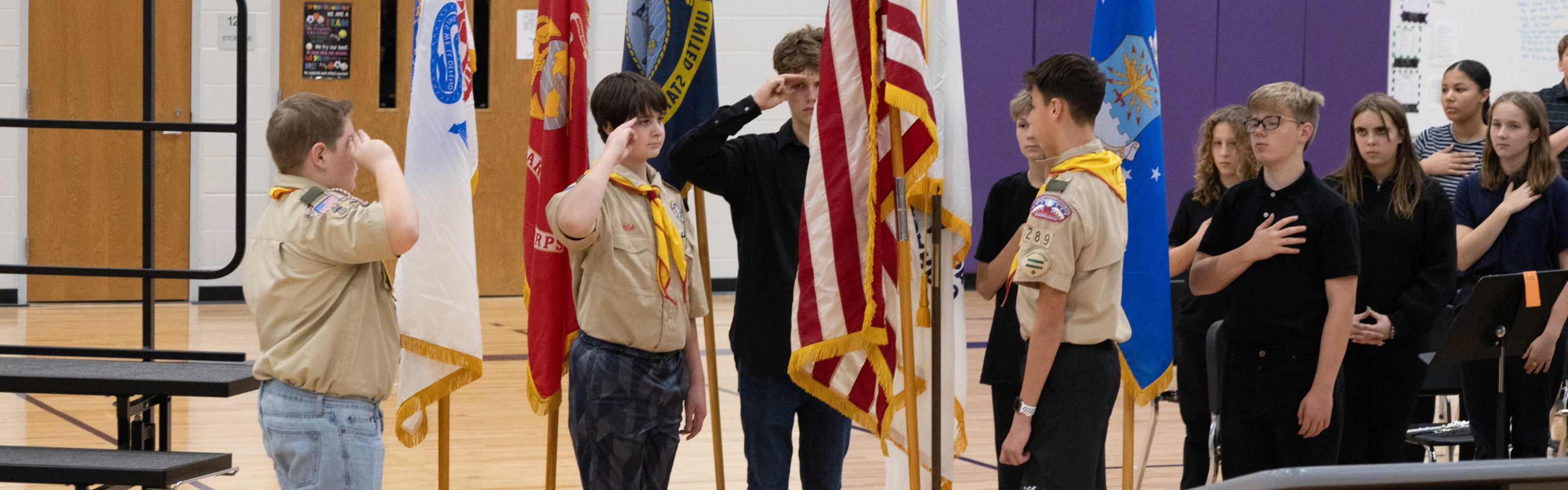 Students saluting the American Flag at FSMS