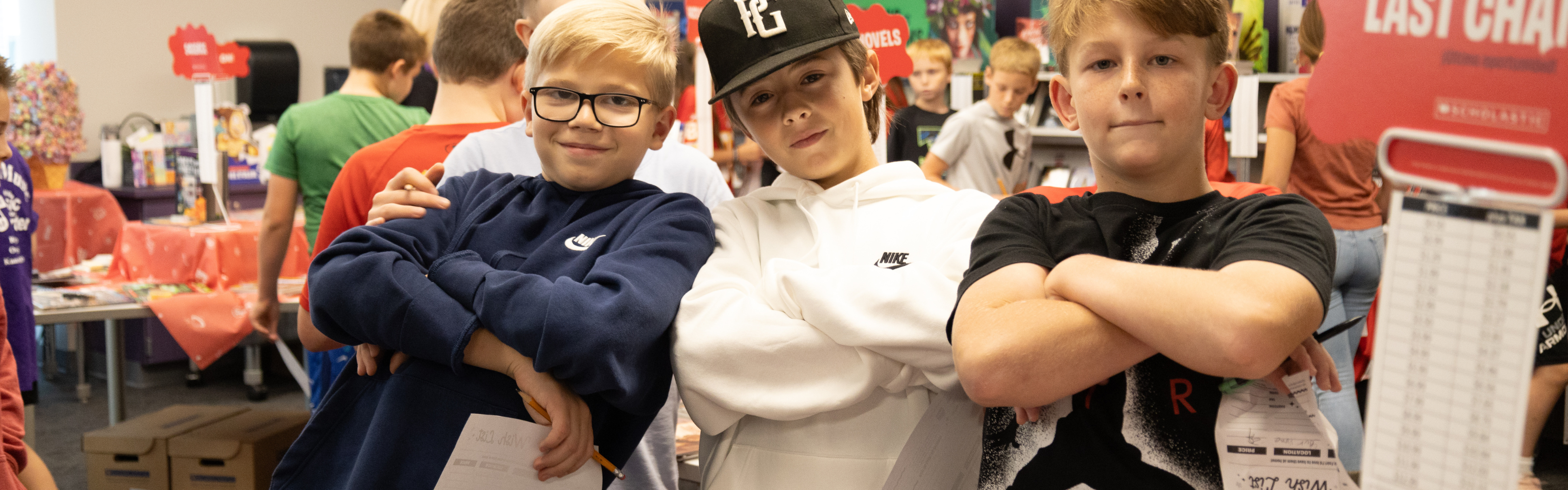 Students with arms crossed from Woodland Spring