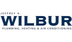 A business card forJeff Wilburg Plumbing and Heating