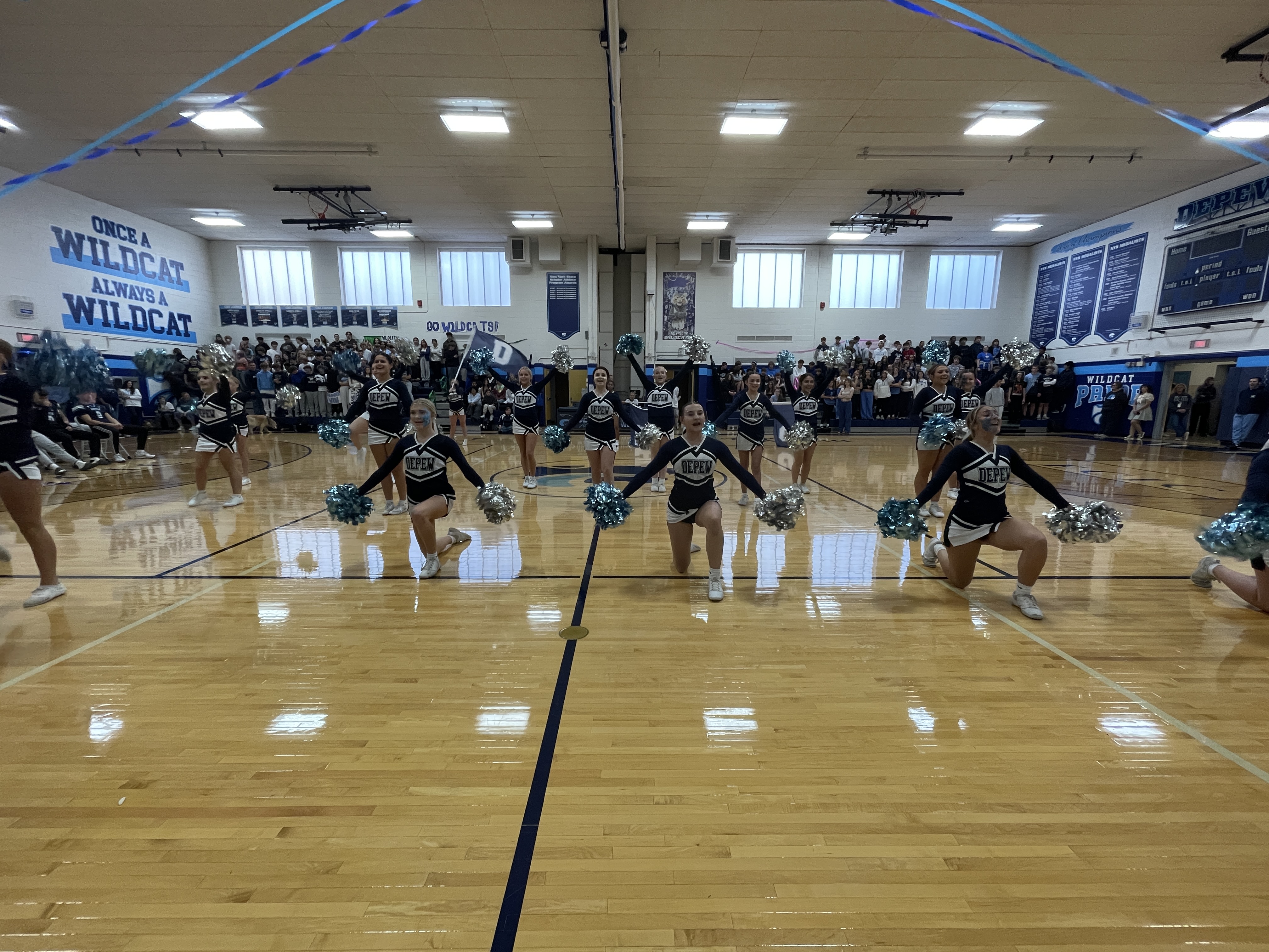 cheerleaders performing during pep rally
