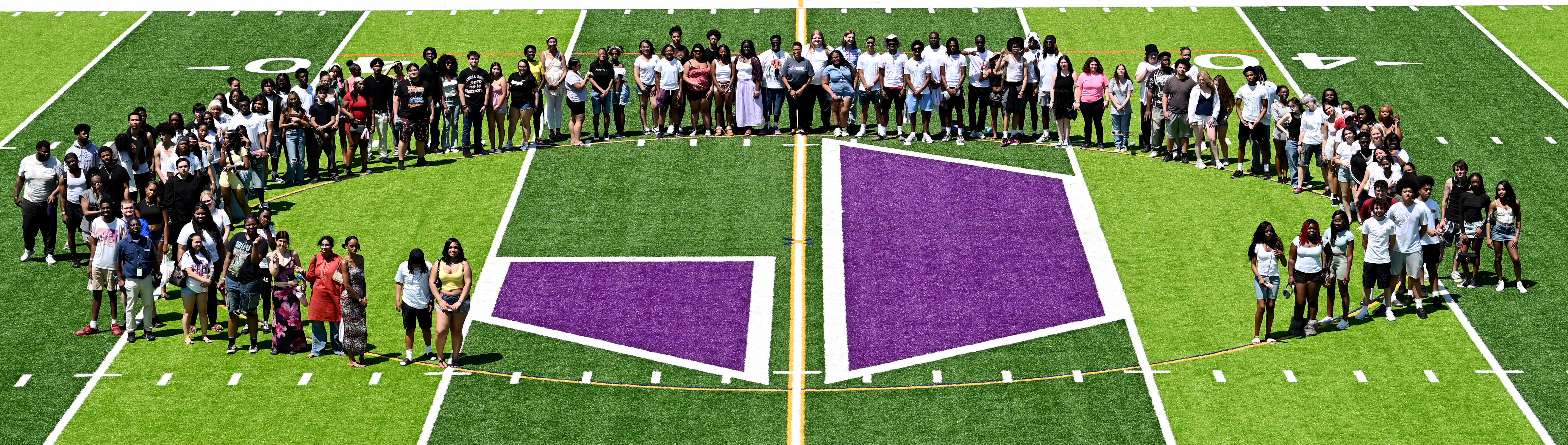 Group of students on the field at Joppatowne High School